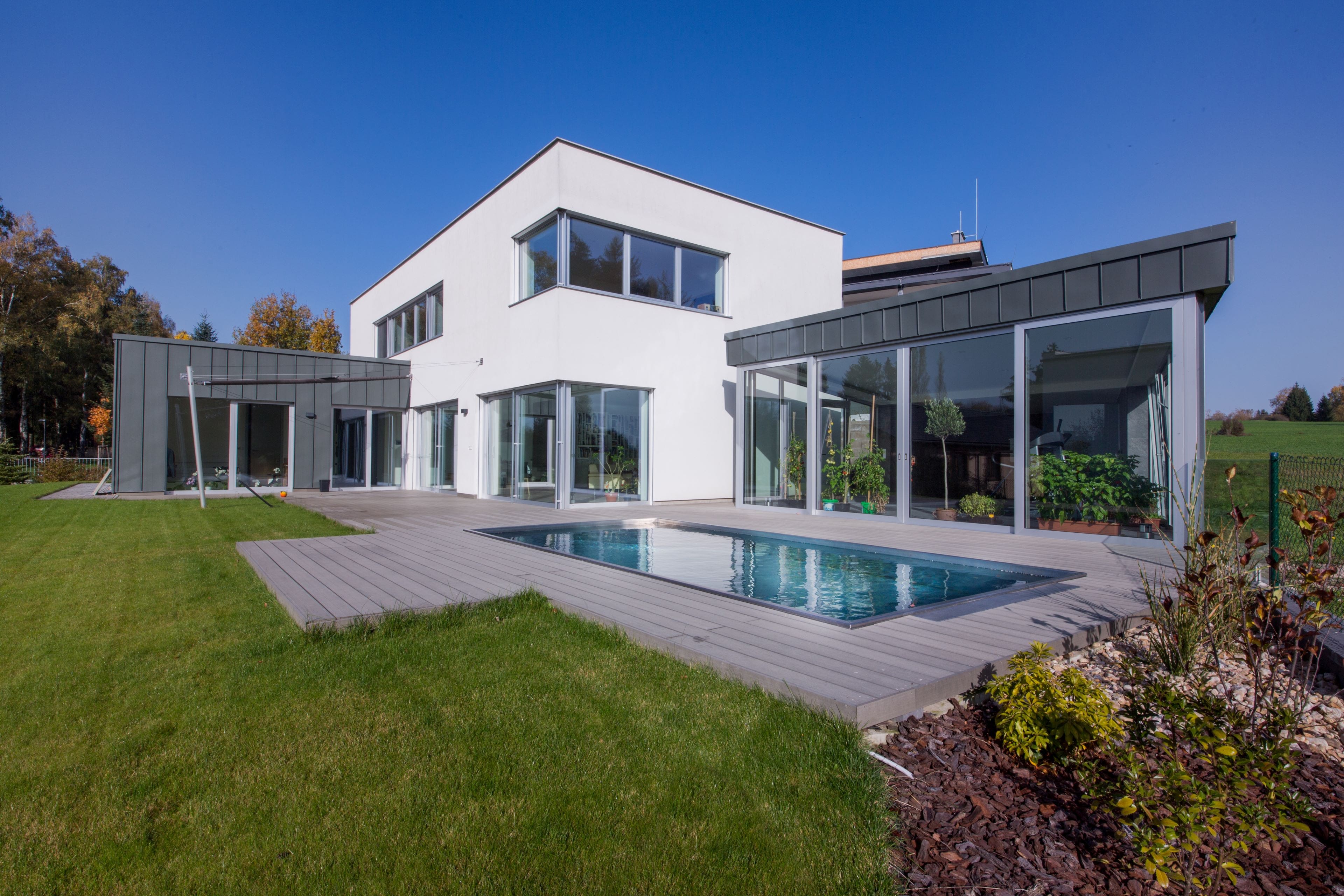 Stainless-Steel Pool on the Terrace of a Family House